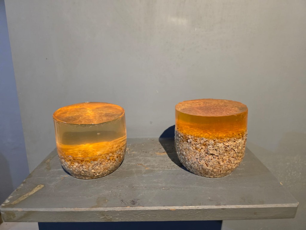 Two jars of soaked dal comparing a worker’s home kitchen with her employer’s kitchen
