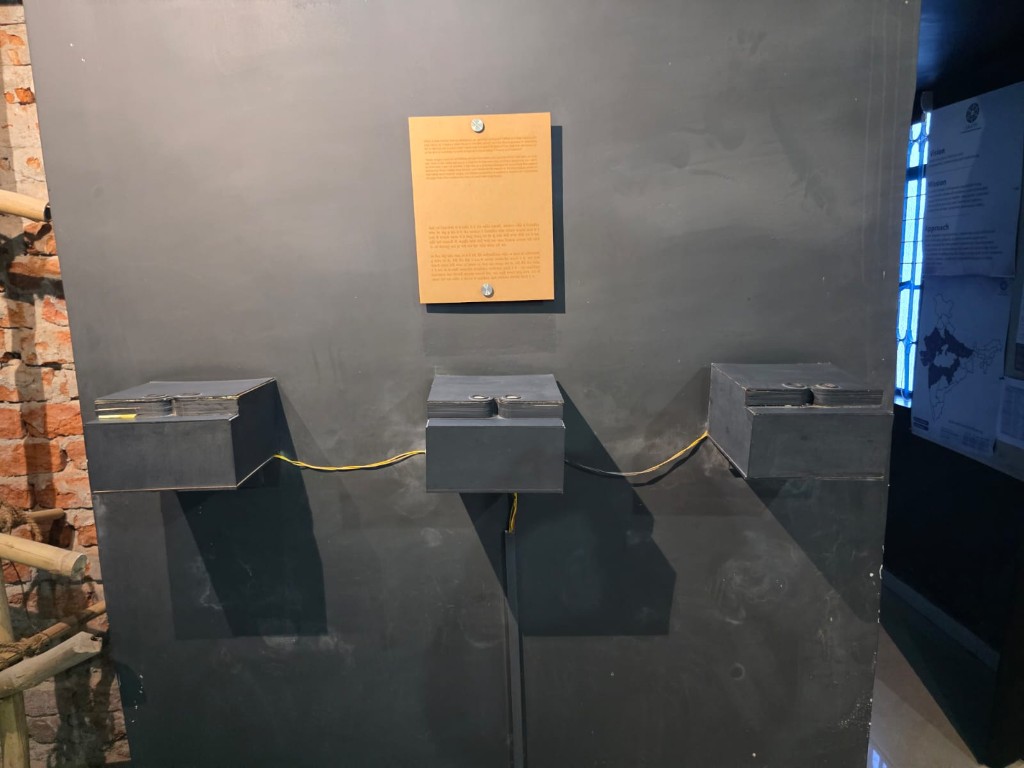 Boxes showing a rural and an urban scene, depicting migration
