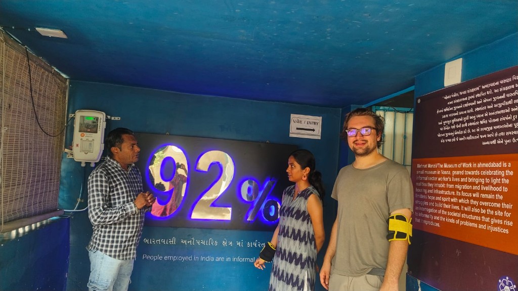 A visitor wearing the 2.5 kg wristband at Mehnat Manzil